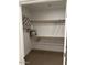 Spacious walk-in closet with ample shelving and hanging space at 2511 W Queen Creek Rd # 177, Chandler, AZ 85248