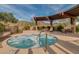 Relaxing community hot tub with pergola cover at 2126 W Red Fox Rd, Phoenix, AZ 85085