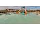 Community pool with fun water slides for  at 2126 W Red Fox Rd, Phoenix, AZ 85085