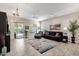 Spacious living room with access to backyard patio at 2126 W Red Fox Rd, Phoenix, AZ 85085