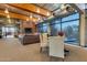 Community lounge with comfortable seating, large windows, and high ceilings at 2126 W Red Fox Rd, Phoenix, AZ 85085
