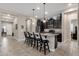 Modern kitchen with granite countertops and island at 2126 W Red Fox Rd, Phoenix, AZ 85085