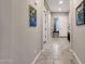 Bright and spacious entry hall with tile flooring at 2126 W Red Fox Rd, Phoenix, AZ 85085