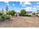 Landscaped front yard with gravel and desert plants at 18256 N 75Th Ave, Glendale, AZ 85308