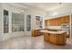 Kitchen boasts an island, ample cabinetry, and large window at 15210 S 20Th St, Phoenix, AZ 85048