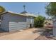 Exterior view of home with AC unit and landscaping at 201 S Greenfield Rd # 324, Mesa, AZ 85206