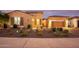 Stunning two-story home with attractive landscaping and a large driveway at 15175 S 185Th Ave, Goodyear, AZ 85338