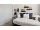 Cozy bedroom with daybed, built-in shelves and plenty of closet space at 15175 S 185Th Ave, Goodyear, AZ 85338