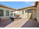 Charming courtyard with fire pit and comfortable seating area at 15175 S 185Th Ave, Goodyear, AZ 85338