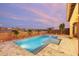 Stunning pool and spa with a spacious patio and outdoor lighting at 15175 S 185Th Ave, Goodyear, AZ 85338