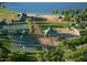 Aerial view of community amenities including tennis and basketball courts at 15175 S 185Th Ave, Goodyear, AZ 85338