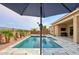 Inviting pool with spacious patio, perfect for relaxation and entertaining at 15175 S 185Th Ave, Goodyear, AZ 85338