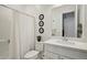 Clean bathroom with white vanity, toilet and shower at 15175 S 185Th Ave, Goodyear, AZ 85338