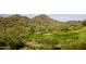 Picturesque golf course nestled in the mountains at 15175 S 185Th Ave, Goodyear, AZ 85338