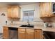 Well-equipped kitchen offering stainless steel appliances and light wood cabinets at 26119 S 196Th S St, Queen Creek, AZ 85142