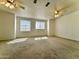 Bright and spacious bedroom with carpeted floor and ceiling fan at 19422 N 67Th Ln, Glendale, AZ 85308