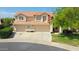 Two-story house with three-car garage and landscaped yard at 19422 N 67Th Ln, Glendale, AZ 85308