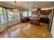 Kitchen boasts granite countertops, wood cabinets, and an island at 19422 N 67Th Ln, Glendale, AZ 85308