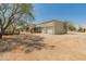 House exterior with two-car garage and desert landscaping at 23907 N 83Rd Ave, Peoria, AZ 85383