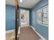 Hallway connecting garage to other areas of the home at 23907 N 83Rd Ave, Peoria, AZ 85383