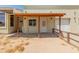 Covered patio with brick flooring and access to garage at 23907 N 83Rd Ave, Peoria, AZ 85383