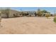 Large backyard with ample space and a view of the home at 23907 N 83Rd Ave, Peoria, AZ 85383