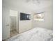 Bedroom with a king-size bed, TV, and walk-in closet at 5818 N Granite Reef Rd, Scottsdale, AZ 85250