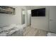 Bedroom with twin beds, large mirror, and closet at 5818 N Granite Reef Rd, Scottsdale, AZ 85250