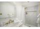 Modern bathroom with marble shower and gold fixtures at 5818 N Granite Reef Rd, Scottsdale, AZ 85250