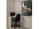 Bright home office features a desk, chair, and large window at 5818 N Granite Reef Rd, Scottsdale, AZ 85250