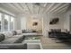 Bright living room with sectional sofa, large windows, and views to the bedroom and kitchen at 5818 N Granite Reef Rd, Scottsdale, AZ 85250