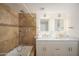 Spa-like bathroom with double vanity and a large shower at 5818 N Granite Reef Rd, Scottsdale, AZ 85250
