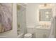 Bathroom featuring marble tile, a bathtub, and updated vanity at 5818 N Granite Reef Rd, Scottsdale, AZ 85250