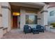 Front entryway with seating area and wooden door at 2336 W Laredo Ln, Phoenix, AZ 85085