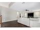 Spacious living room with dark hardwood floors and a ceiling fan at 2336 W Laredo Ln, Phoenix, AZ 85085