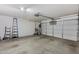 Spacious garage with overhead door and ample storage space at 13164 W Ocotillo Ln, Surprise, AZ 85374