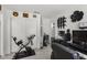 Home office features built-in shelving and plenty of space for a desk and workout equipment at 13164 W Ocotillo Ln, Surprise, AZ 85374