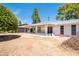 Covered patio with decorative block wall and sliding glass door at 15630 N Lakeforest Dr, Sun City, AZ 85351