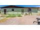 Back of house showing additional structures at 1517 W Sahuaro Dr, Phoenix, AZ 85029