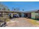 Detached garage and covered carport area at 1517 W Sahuaro Dr, Phoenix, AZ 85029