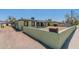 House exterior, light green with small yard at 1517 W Sahuaro Dr, Phoenix, AZ 85029