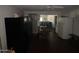 Open concept kitchen with dining area and view into living room at 1517 W Sahuaro Dr, Phoenix, AZ 85029