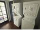 Convenient laundry room with stackable washer and dryer at 1517 W Sahuaro Dr, Phoenix, AZ 85029