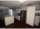 Modern kitchen with stainless steel appliances and island at 1517 W Sahuaro Dr, Phoenix, AZ 85029