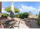 Backyard patio with seating area and golf course view at 2384 E Antigua Dr, Casa Grande, AZ 85194