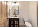 Powder room with a pedestal sink and modern fixtures at 40105 N 2Nd Way, Phoenix, AZ 85086