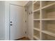 Storage room with built-in shelves and coat hooks at 40105 N 2Nd Way, Phoenix, AZ 85086