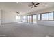 Bonus room featuring carpet, large windows, and mountain views at 40105 N 2Nd Way, Phoenix, AZ 85086