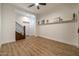 Spacious bedroom with wood flooring and access to hallway at 40105 N 2Nd Way, Phoenix, AZ 85086