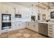 Kitchen with white cabinets, stainless steel appliances, and an open design at 40105 N 2Nd Way, Phoenix, AZ 85086